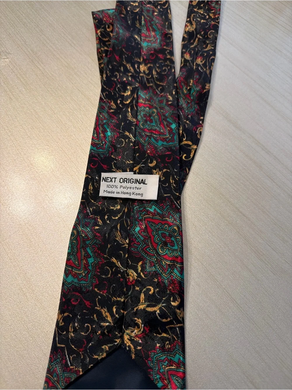 Classic Black Paisley Men's Tie with Red & Green Accents